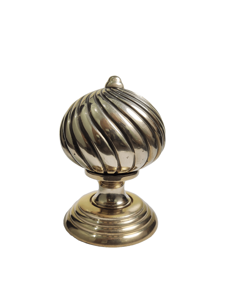 Spiral-pattern mortice door knob in polished brass, manufactured by Nexus Fittings in Aligarh, India