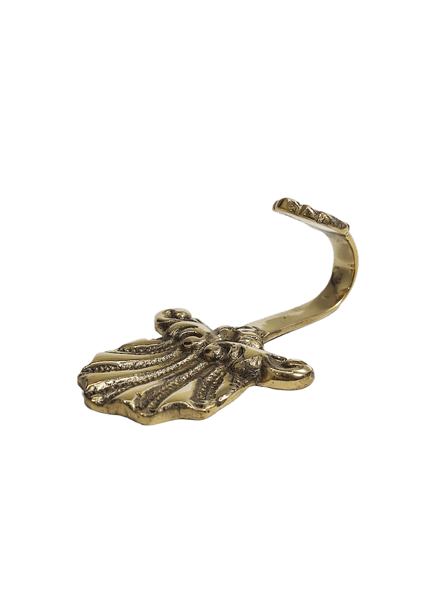 Peacock-shaped brass hook with decorative detail