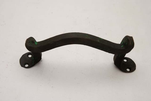 Wrought iron handle for doors and gates