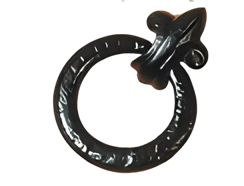 Black antique twisted ring door knocker on fleur-de-lis rosette