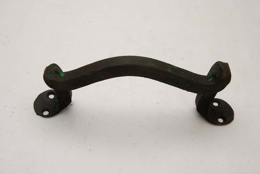 Wrought iron handle for doors and gates